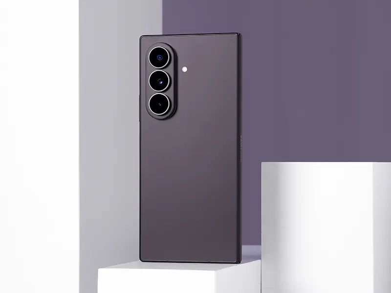 Studio shot of the Galaxy Z Fold8 Ultra in folded state at three-quarter angle emphasizing the three-lens camera module on the rear