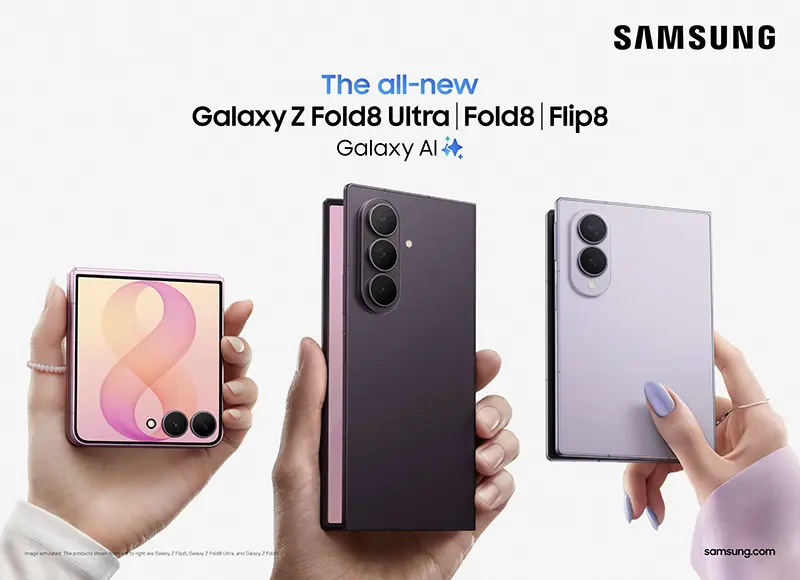 A folded clamshell foldable and two book-type foldables held in separate hands, showing the size and camera layout gaps