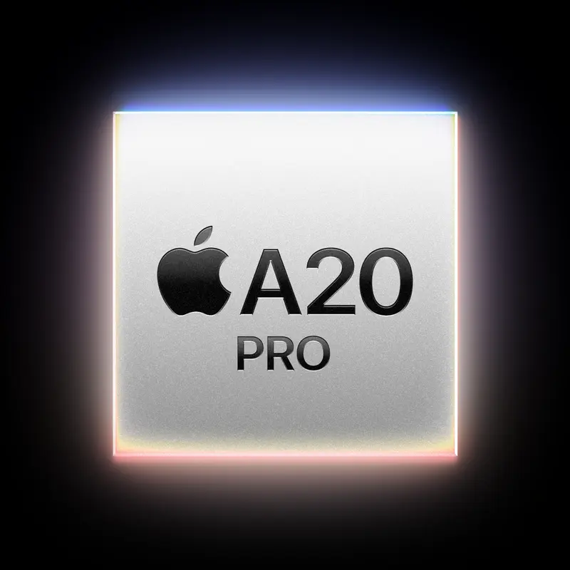 暗い背景に置かれたiPhone 18 ProのA20 Proチップパッケージを正面から捉え、縁に虹色の発光が広がり上面にチップ名が刻まれている